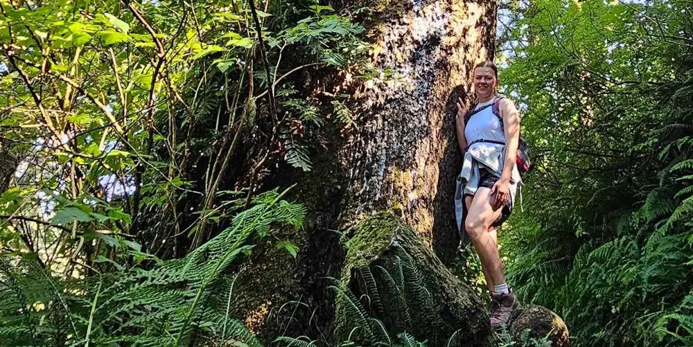 Audrey Estrada Standing In Forest